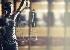 litigation scales of justice